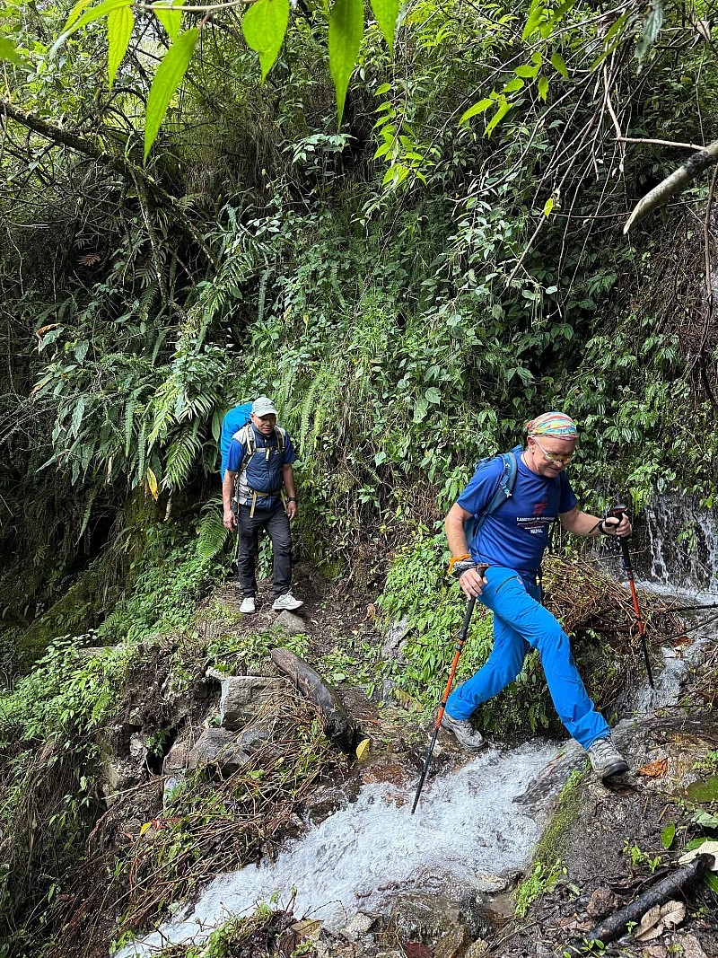 Kanchenjunga circuit trekking through waterfall