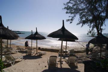 à la plage entre vent rafraichissant et soleil brûlant